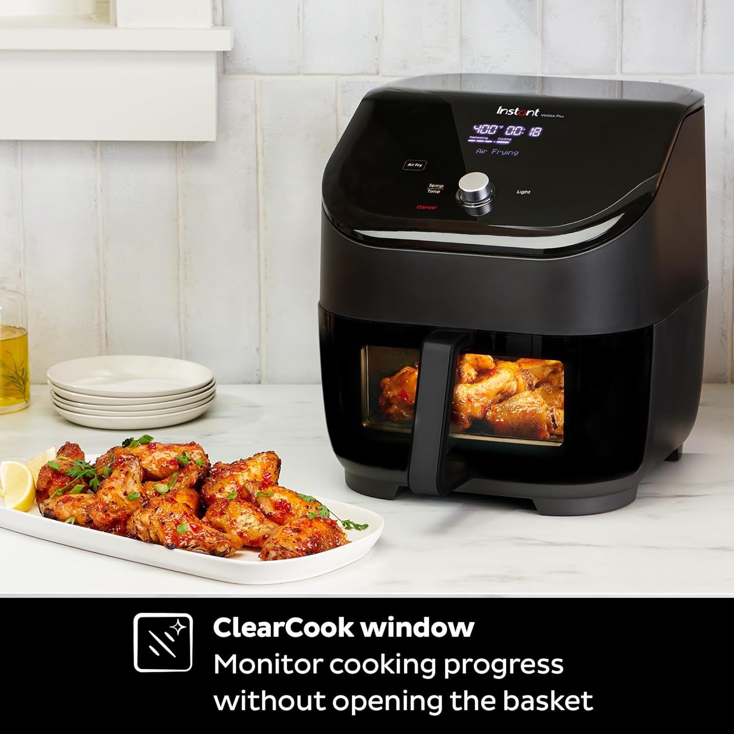 6-liter air fryer, equipped with a clear viewing cooking window, a digital touchscreen, built-in applications (including over 100 recipes), single-bowl design, and a black exterior.